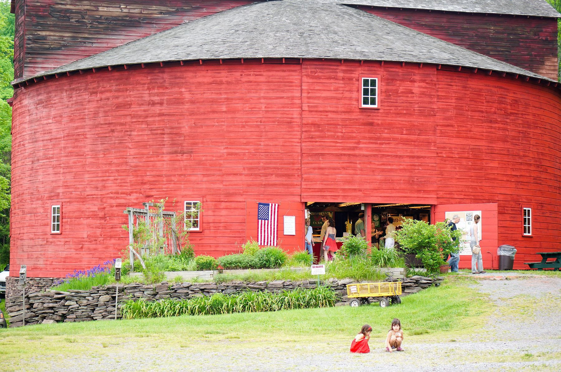 The Round Barn in Halcottsville with market stalls outside
